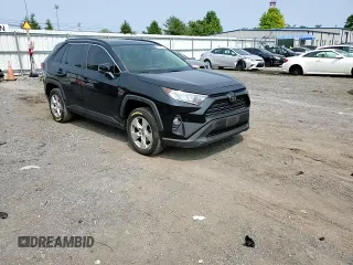 2019 Toyota RAV4 XLE with VIN JTMP1RFV8KJ001784, listed as a Copart auction lot 59109235 with 98,858 mi miles and Salvage title. Bid and sale history available at DreamBid. Image 14.