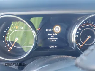 2022 Jeep Wrangler Unlimited Sport S with VIN 1C4HJXDG5NW254016, listed as a IAAI auction lot 42214730 with 42,003 mi miles and . Bid and sale history available at DreamBid. Image 7.