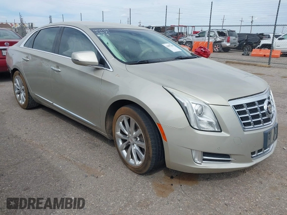 2013 Cadillac XTS Luxury with VIN 2G61P5S30D9132193, listed as a IAAI auction lot 41897709 with 140,780 mi miles and . Bid and sale history available at DreamBid. Image 1.