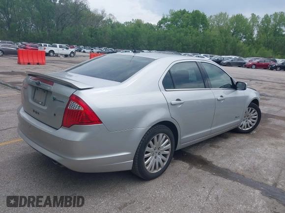2010 Ford Fusion Hybrid with VIN 3FADP0L37AR209987, listed as a IAAI auction lot 42094849 with 124,912 mi miles. Bid and sale history available at carsss.com. Image 4.