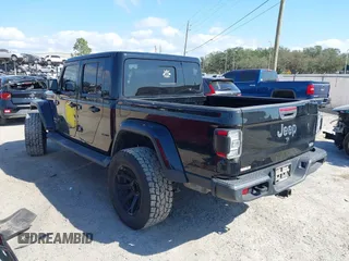 2020 Jeep Gladiator Overland with VIN 1C6HJTFG2LL149056, listed as a IAAI auction lot 41524168 with 113,503 mi miles and . Bid and sale history available at DreamBid. Image 3.