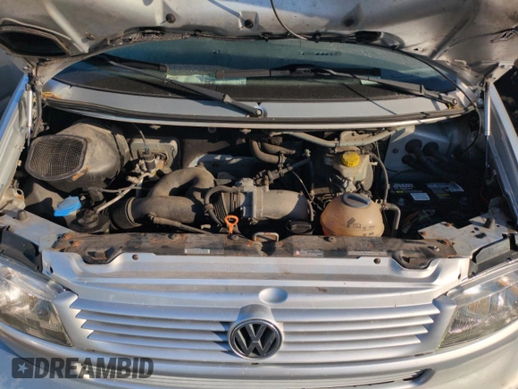 2003 Volkswagen EuroVan MV с VIN WV2NB47083H002700, выставлен на аукционе Copart как лот 76117874 с пробегом 186 942 миль миль и На запчасти • Non repairable. История ставок и продаж доступна на DreamBid. Изображение 12.