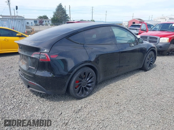 2022 Tesla Model Y Performance z VIN 7SAYGDEF5NF546680, wystawiony jako IAAI lot #42229359 z przebiegiem 55 597 mil mil oraz . Historia ofert i sprzedaży dostępna na DreamBid. Obrazek 4.