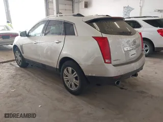 2014 Cadillac SRX Luxury Collection with VIN 3GYFNEE35ES681424, listed as a IAAI auction lot 41854969 with 135,163 mi miles. Bid and sale history available at carsss.com. Image 3.