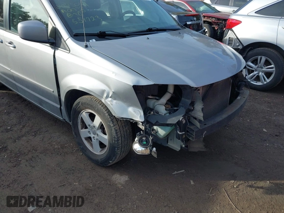 2013 Dodge Grand Caravan SXT with VIN 2C4RDGCG8DR551723, listed as a IAAI auction lot 41510574 with 183,432 mi miles and . Bid and sale history available at DreamBid. Image 6.