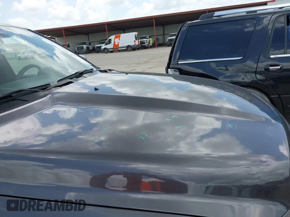 2024 Ram 1500 Warlock with VIN 1C6RR6LG6RS142337, listed as a IAAI auction lot 42734480 with 36,410 mi miles and . Bid and sale history available at DreamBid. Image 20.