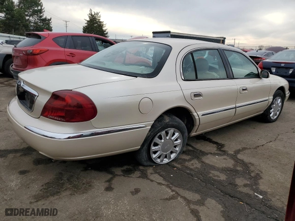 2001 Lincoln Continental with VIN 1LNHM97V11Y681989, listed as a Copart auction lot 46539725 with 107,130 mi miles and Salvage Title. Bid and sale history available at carsss.com. Image 3.