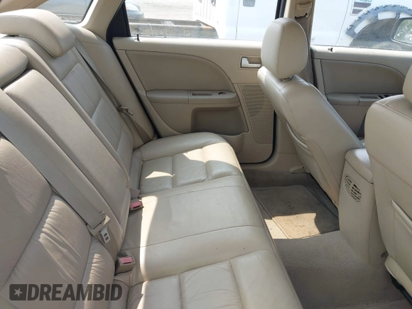 2005 Ford Five Hundred Limited with VIN 1FAHP25175G135427, listed as a IAAI auction lot 42383896 with 299,427 mi miles and . Bid and sale history available at DreamBid. Image 8.