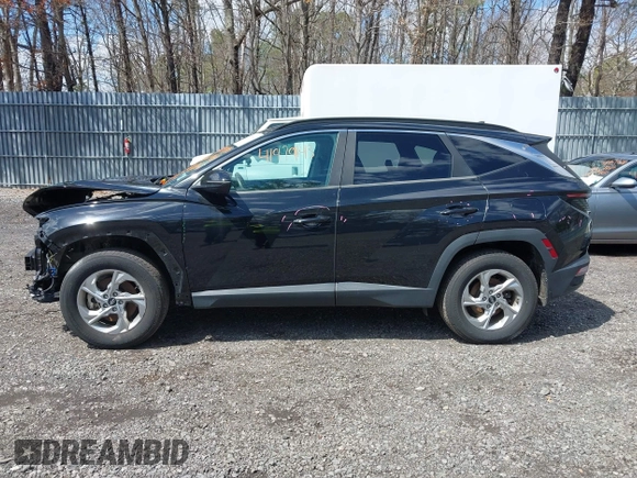 2022 Hyundai Tucson SEL z VIN 5NMJBCAE9NH034987, wystawiony jako IAAI lot #41979143 z przebiegiem 68 625 mil mil oraz . Historia ofert i sprzedaży dostępna na DreamBid. Obrazek 14.