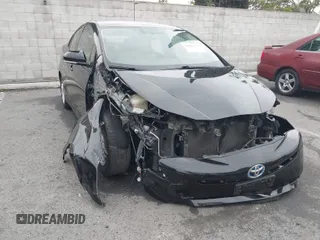 2016 Toyota Prius Four z VIN JTDKARFU4G3005103, wystawiony jako IAAI lot #41807171 z przebiegiem 127 105 mil mil oraz . Historia ofert i sprzedaży dostępna na DreamBid. Obrazek 1.
