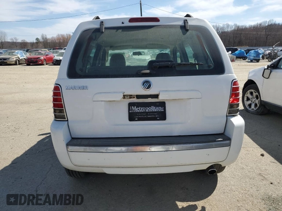 2005 Mercury Mariner Convenience с VIN 4M2YU56Z65DJ16579, выставлен на аукционе Copart как лот 48474465 с пробегом Не указан миль и На запчасти • Non repairable. История ставок и продаж доступна на DreamBid. Изображение 6.