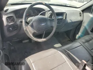 2004 Ford F-150 XL with VIN 2FTRF17294CA59985, listed as a Copart auction lot 55296195 with 220,933 mi miles and Salvage title. Bid and sale history available at DreamBid. Image 8.