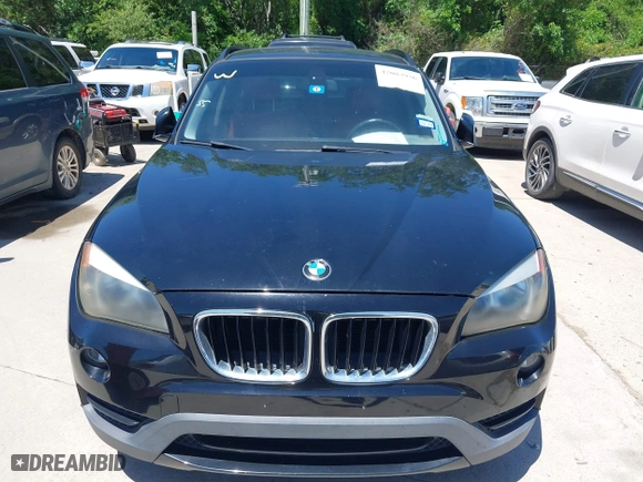 2014 BMW X1 sDrive28i with VIN WBAVM1C5XEVW51666, listed as a IAAI auction lot 42083936 with 176,465 mi miles. Bid and sale history available at carsss.com. Image 6.