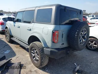 2023 Ford Bronco z VIN 1FMDE5BH5PLB37801, wystawiony jako IAAI lot #41691282 z przebiegiem 21 129 mil mil oraz . Historia ofert i sprzedaży dostępna na DreamBid. Obrazek 3.