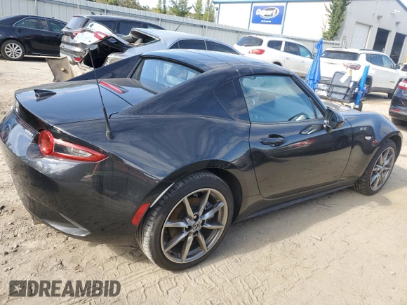 2022 Mazda MX-5 Miata Grand Touring z VIN JM1NDAM78N0507632, wystawiony jako Copart lot #81311754 z przebiegiem 4 720 mil mil oraz Szkoda całkowita • Salvage title. Historia ofert i sprzedaży dostępna na DreamBid. Obrazek 3.