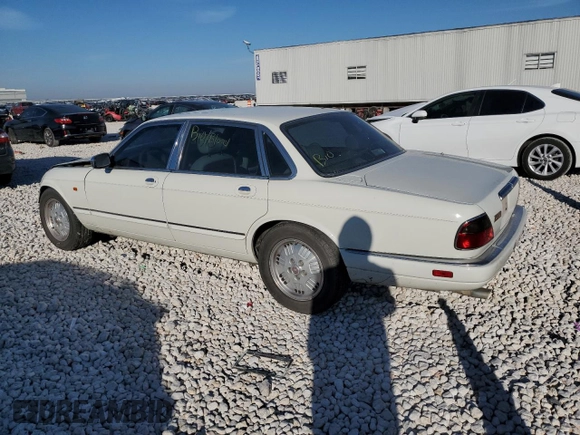 1995 Jaguar XJ with VIN SAJKX1745SC739290, listed as a Copart auction lot 82887524 with Not provided miles and Salvage title. Bid and sale history available at DreamBid. Image 2.