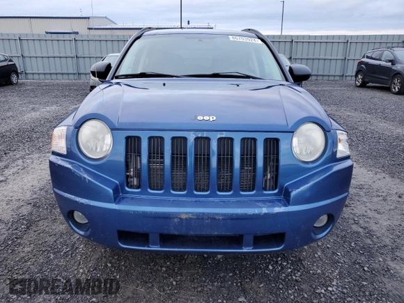 2009 Jeep Compass North with VIN 1J4FT47B19D234521, listed as a Copart auction lot 86703924 with 201,476 mi miles and Clean Title. Bid and sale history available at carsss.com. Image 5.
