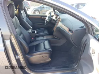 2020 Tesla Model X Long Range with VIN 5YJXCBE2XLF230629, listed as a IAAI auction lot 41925961 with 35,979 mi miles. Bid and sale history available at carsss.com. Image 5.