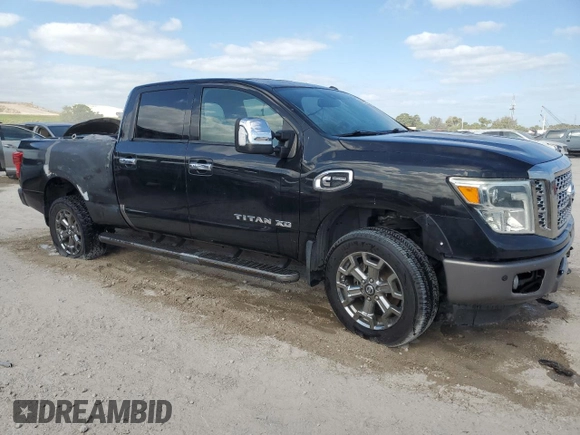 2016 Nissan Titan Platinum Reserve z VIN 1N6BA1F25GN508897, wystawiony jako Copart lot #55090755 z przebiegiem 175 850 mil mil oraz Czysty tytuł • Clean title. Historia ofert i sprzedaży dostępna na DreamBid. Obrazek 4.