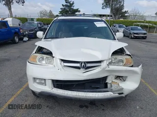 2004 Acura MDX Touring Pkg w/Navigation with VIN 2HNYD18834H520180, listed as a IAAI auction lot 41934124 with 201,817 mi miles. Bid and sale history available at carsss.com. Image 12.