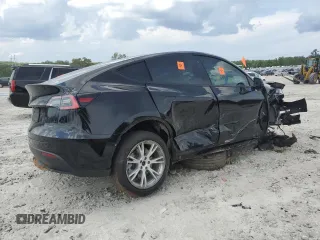 2021 Tesla Model Y Long Range z VIN 5YJYGDEE7MF081337, wystawiony jako Copart lot #55678295 z przebiegiem 58 809 mil mil oraz Szkody całkowita. Historia ofert i sprzedaży dostępna na DreamBid. Obrazek 3.