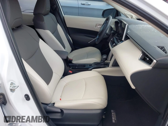 2024 Toyota Corolla Cross XLE with VIN 7MUDAAAG5RV097731, listed as a IAAI auction lot 42227874 with 9,151 mi miles and . Bid and sale history available at DreamBid. Image 5.