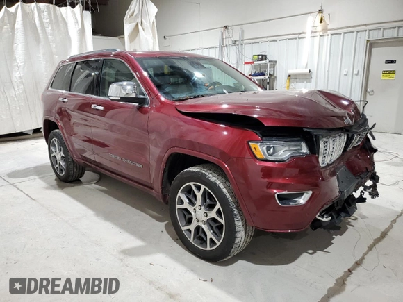 2019 Jeep Grand Cherokee Overland with VIN 1C4RJFCT3KC687246, listed as a Copart auction lot 52098394 with 74,113 mi miles and Salvage Title. Bid and sale history available at carsss.com. Image 4.