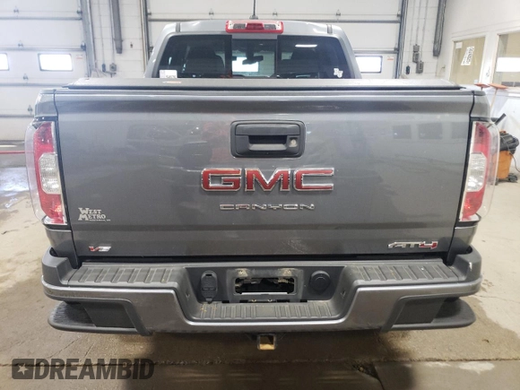 2021 GMC Canyon 4WD AT4 z VIN 1GTG6FEN1M1203936, wystawiony jako Copart lot #56041315 z przebiegiem 54 939 mil mil oraz Szkoda całkowita • Salvage title. Historia ofert i sprzedaży dostępna na DreamBid. Obrazek 6.