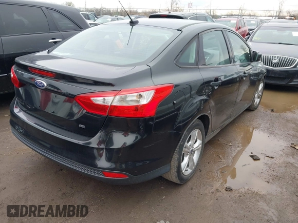2013 Ford Focus SE with VIN 1FADP3F24DL300450, listed as a IAAI auction lot 41880801 with 161,633 mi miles. Bid and sale history available at carsss.com. Image 4.