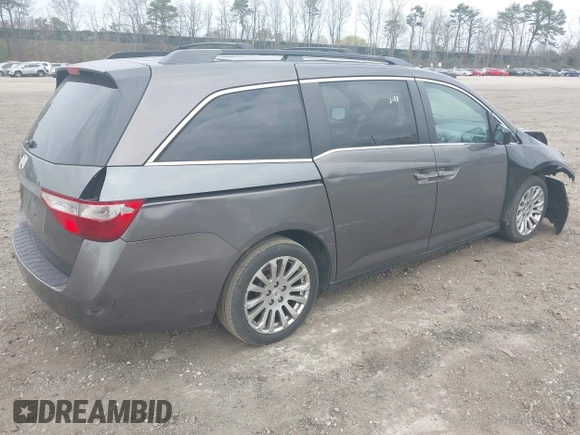 2011 Honda Odyssey EX with VIN 5FNRL5H49BB082706, listed as a IAAI auction lot 42080414 with 228,176 mi miles and . Bid and sale history available at carsss.com. Image 4.