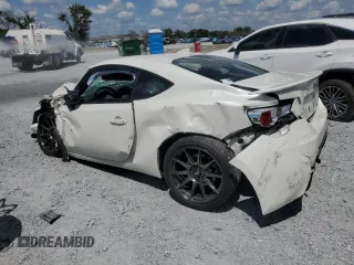 2015 Scion FR-S with VIN JF1ZNAA1XF8705667, listed as a Copart auction lot 52681035 with 124,971 mi miles and Salvage Title. Bid and sale history available at carsss.com. Image 2.