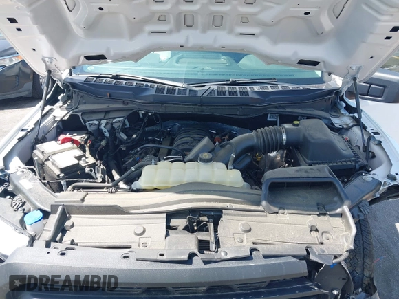 2022 Ford F-150 XL with VIN 1FTFX1E58NFB73477, listed as a IAAI auction lot 42313280 with 18,935 mi miles and . Bid and sale history available at DreamBid. Image 10.