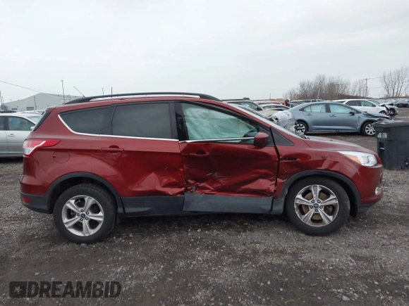 2016 Ford Escape SE with VIN 1FMCU9GX8GUB28820, listed as a IAAI auction lot 40874359 with 134,459 mi miles. Bid and sale history available at carsss.com. Image 13.