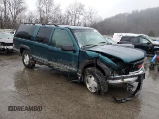 1995 GMC Suburban z VIN 1GKFK16K0SJ748087, wystawiony jako Copart lot #85121834 z przebiegiem 191 550 mil mil oraz Szkoda całkowita • Salvage title. Historia ofert i sprzedaży dostępna na DreamBid. Obrazek 4.