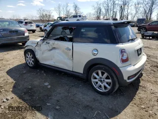 2011 MINI Hardtop S with VIN WMWSV3C59BTY23205, listed as a Copart auction lot 48672675 with 120,457 mi miles and Salvage Title. Bid and sale history available at DreamBid. Image 2.