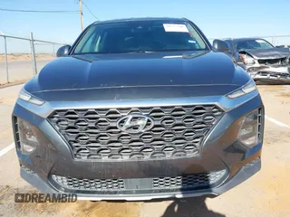 2019 Hyundai Santa Fe SE with VIN 5NMS23AD2KH134016, listed as a IAAI auction lot 41977240 with 61,448 mi miles and . Bid and sale history available at DreamBid. Image 12.