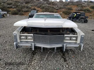1975 Cadillac Eldorado z VIN 6L47S5Q245199, wystawiony jako Copart lot #51089325 z przebiegiem 2991 mil mil oraz Tytuł czysty. Historia ofert i sprzedaży dostępna na DreamBid. Obrazek 5.