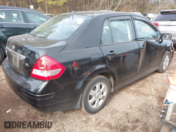 2011 Nissan Versa 1.8 S with VIN 3N1BC1AP5BL444050, listed as a IAAI auction lot 41396987 with 198,463 mi miles. Bid and sale history available at carsss.com. Image 4.