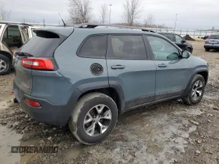 2014 Jeep Cherokee Trailhawk with VIN 1C4PJMBB9EW251749, listed as a Copart auction lot 49712915 with 94,289 mi miles and Clean Title. Bid and sale history available at carsss.com. Image 3.