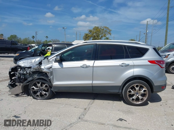 2014 Ford Escape Titanium с VIN 1FMCU0J9XEUB93591, выставлен на аукционе IAAI как лот 41721869 с пробегом 98 859 миль миль и . История ставок и продаж доступна на DreamBid. Изображение 14.