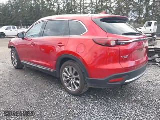 2016 Mazda CX-9 Grand Touring with VIN JM3TCBDY3G0113300, listed as a IAAI auction lot 41679987 with 69,024 mi miles. Bid and sale history available at carsss.com. Image 3.