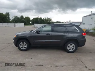 2017 Jeep Grand Cherokee Laredo with VIN 1C4RJFAG1HC604461, listed as a IAAI auction lot 42685509 with 143,462 mi miles and . Bid and sale history available at DreamBid. Image 14.
