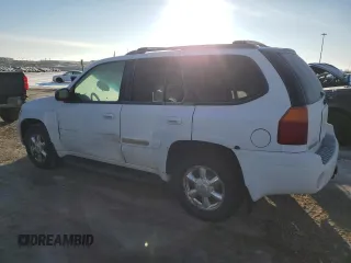 2005 GMC Envoy SLT with VIN 1GKDT13S452369908, listed as a Copart auction lot 49643375 with 0 mi miles and Salvage Title. Bid and sale history available at carsss.com. Image 2.