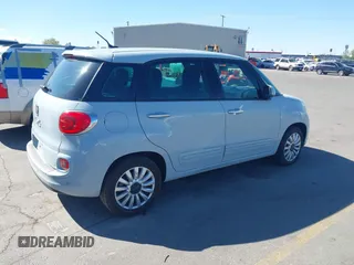 2014 FIAT 500L Easy with VIN ZFBCFABH9EZ010519, listed as a IAAI auction lot 42150633 with 60,724 mi miles. Bid and sale history available at carsss.com. Image 4.