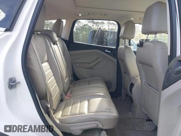 2013 Ford Escape SEL with VIN 1FMCU9H99DUA97959, listed as a IAAI auction lot 41879967 with 149,456 mi miles. Bid and sale history available at carsss.com. Image 8.