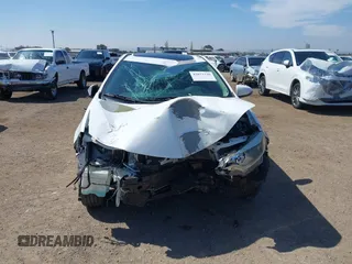 2014 Toyota Corolla L with VIN 5YFBURHE7EP049355, listed as a IAAI auction lot 42073330 with 129,605 mi miles and . Bid and sale history available at DreamBid. Image 13.