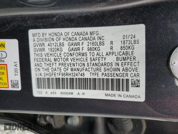 2024 Honda Civic Touring z VIN 2HGFE1F96RH324748, wystawiony jako Copart lot #58833725 z przebiegiem Nie podano mil oraz Szkoda całkowita • Salvage title. Historia ofert i sprzedaży dostępna na DreamBid. Obrazek 12.