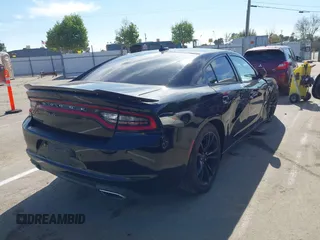 2016 Dodge Charger SXT with VIN 2C3CDXHG6GH146764, listed as a IAAI auction lot 42020618 with 154,693 mi miles and . Bid and sale history available at carsss.com. Image 4.