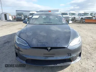 2021 Tesla Model S Plaid with VIN 5YJSA1E60MF455768, listed as a IAAI auction lot 41603504 with 27,398 mi miles. Bid and sale history available at carsss.com. Image 6.