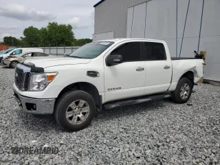 2017 Nissan Titan SV z VIN 1N6AA1EJ2HN570490, wystawiony jako Copart lot #50688785 z przebiegiem 122 817 mil mil oraz Szkody całkowita. Historia ofert i sprzedaży dostępna na DreamBid. Obrazek 1.
